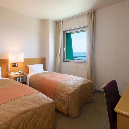 Hotel Folkloro Ominato Mutsu Zimmer foto